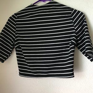 Black and white striped zip up shirt.